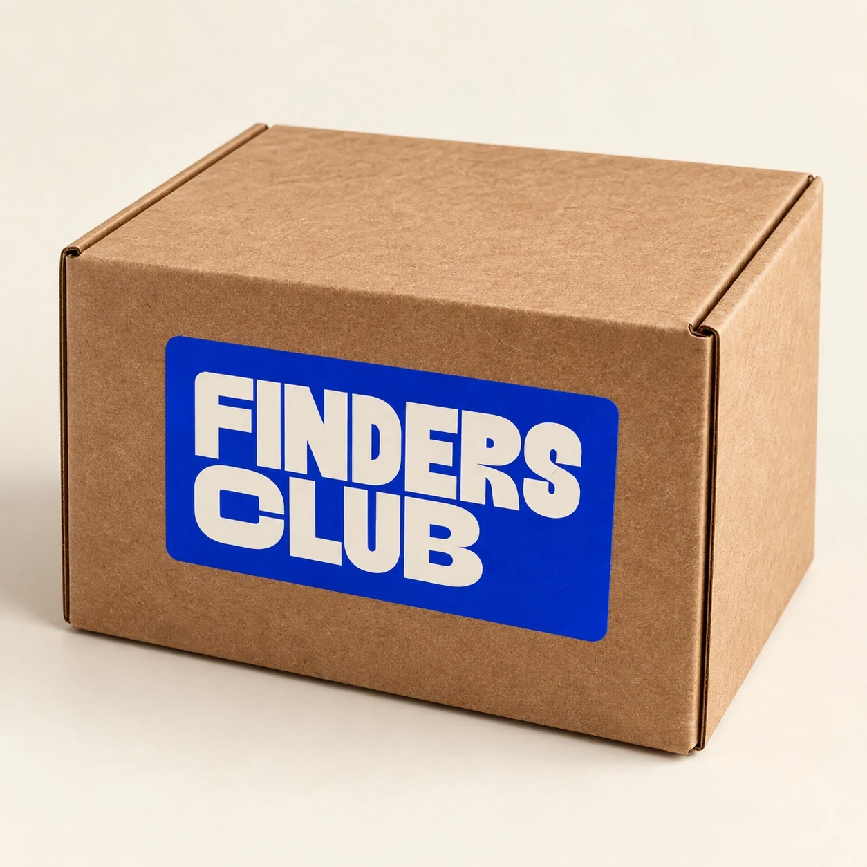 Finders Club packaging mockup featuring its blue and cream brand identity