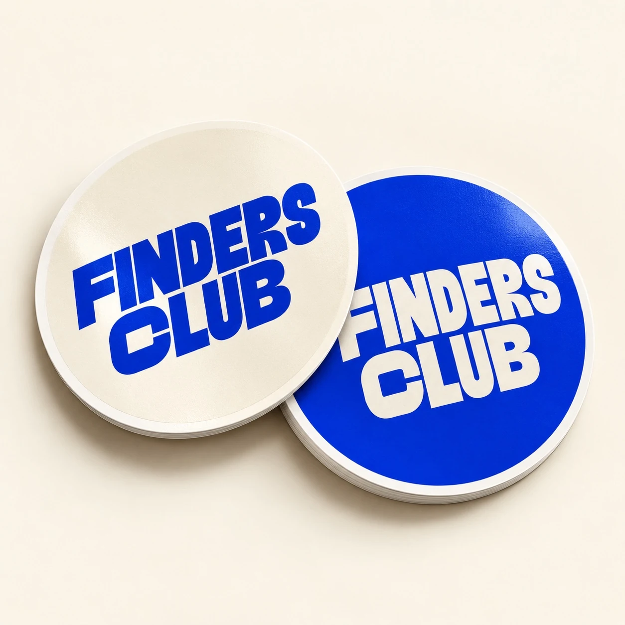 Finders Club round sticker mockups in blue and cream